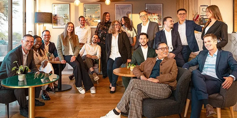 opti_Photo-de-Groupe-interieur_2025-WEB-1-e1765470871374